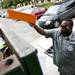 Jason Dykes removes trash from Seller Hall on Saturday. "They'll be a lot of trash and a lot of boxes to take out," Dykes said. Daniel Brenner I AnnArbor.com